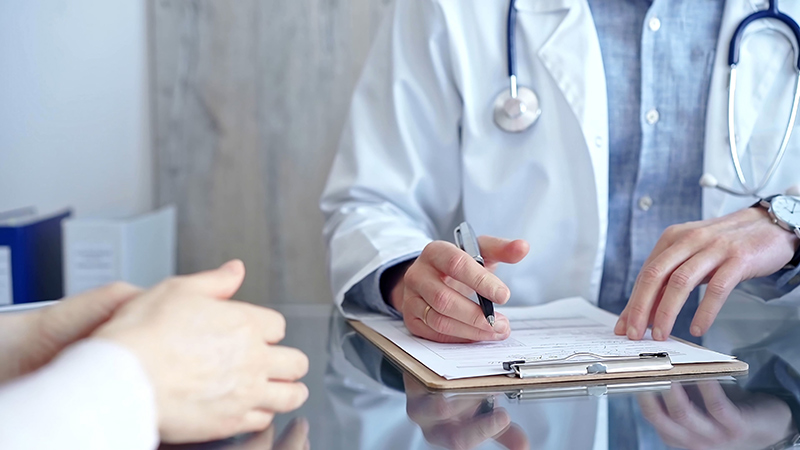 Female patient having an abortion consultation with a specialist.